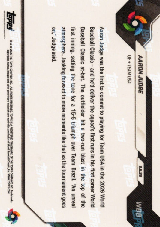 Reverse side of baseball card showing black foil background with printed text describing Aaron Judge's World Baseball Classic achievement and card details.