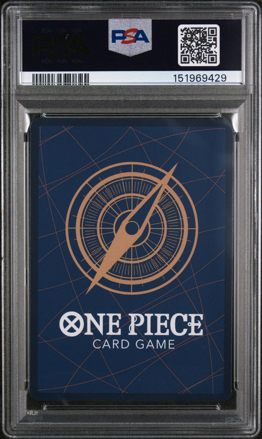PSA-graded One Piece trading card in clear plastic slab with compass logo design and blue background visible through case.