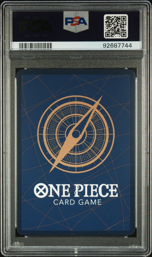 PSA-graded One Piece trading card in clear plastic slab showing blue card back with gold compass design and white "ONE PIECE CARD GAME" text.