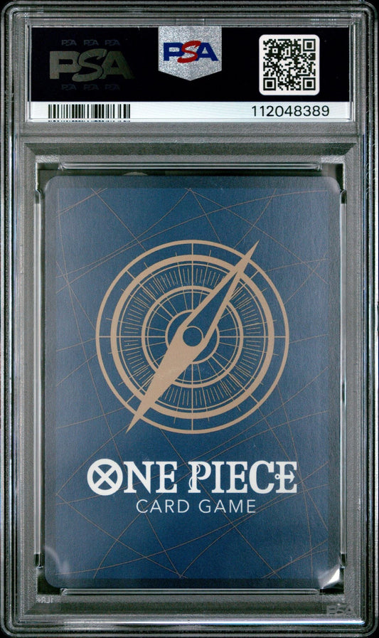 PSA-graded trading card in clear protective case showing blue card back with compass design and One Piece Card Game text.