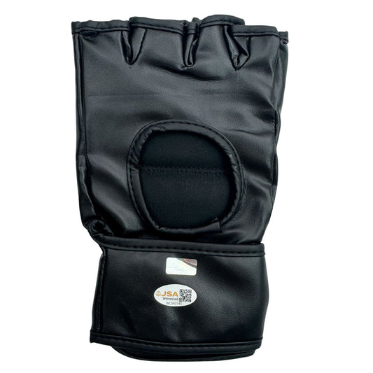 Black leather UFC MMA fighting glove displaying open palm with JSA authenticity label and QR code on wrist cuff.