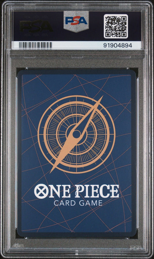 PSA-graded One Piece Card Game card in clear plastic slab showing blue back with compass rose design and white text.