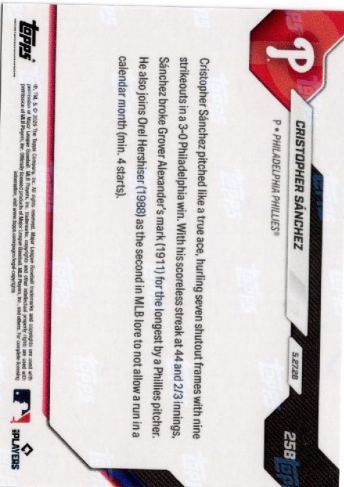 Reverse side of baseball card showing text biography and statistics on white background with red and black design elements.