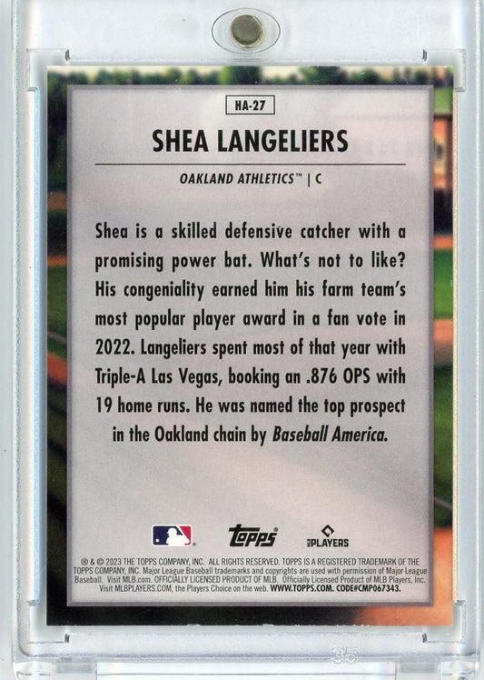 Back of 2023 Topps baseball card HA-27 showing Shea Langeliers text biography against white background in clear plastic case.