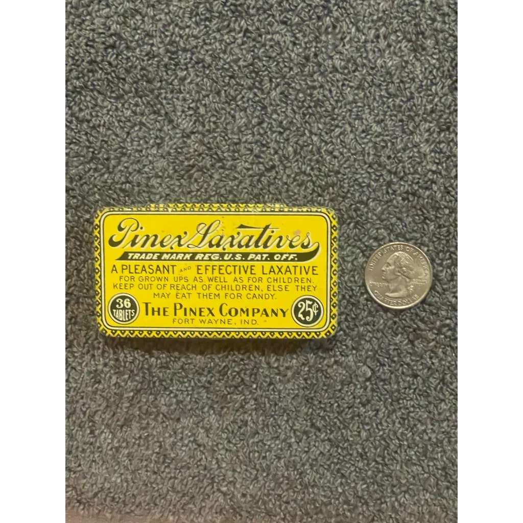 Vintage Pinex Laxative medicine tin with yellow label from the 1910s