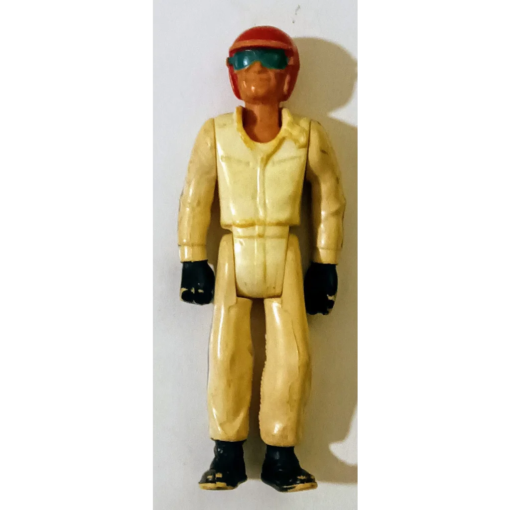 1976 Fisher Price Evil Knievel action figure in yellow suit with red helmet