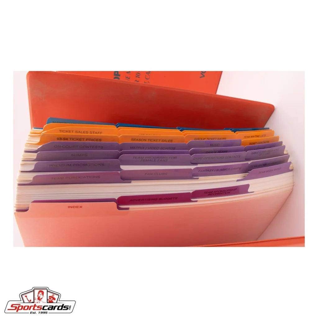Orange tabbed binder for 1993 NBA league meetings sports cards