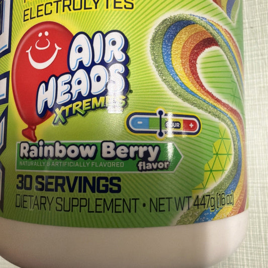 Close-up of Airheads Xtreme Rainbow Berry BCAA powder container showing red balloon logo, colorful rainbow swirl design, and 30 servings label on lime green background.