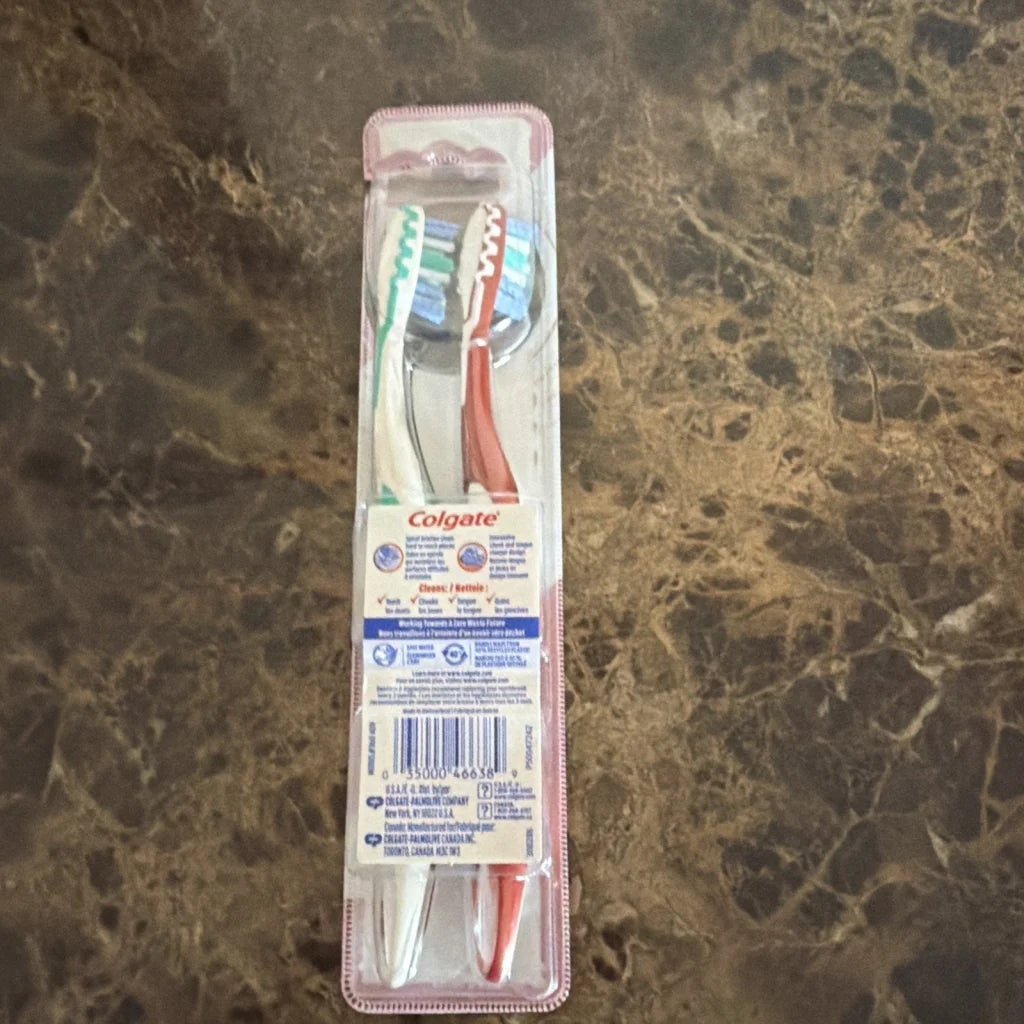 2 Colgate 360 advanced optic white medium toothbrushes in clear package