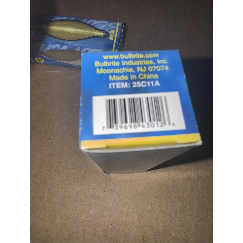 Bulbrite Spunlite 25W 130V amber lightbulb in blue yellow box