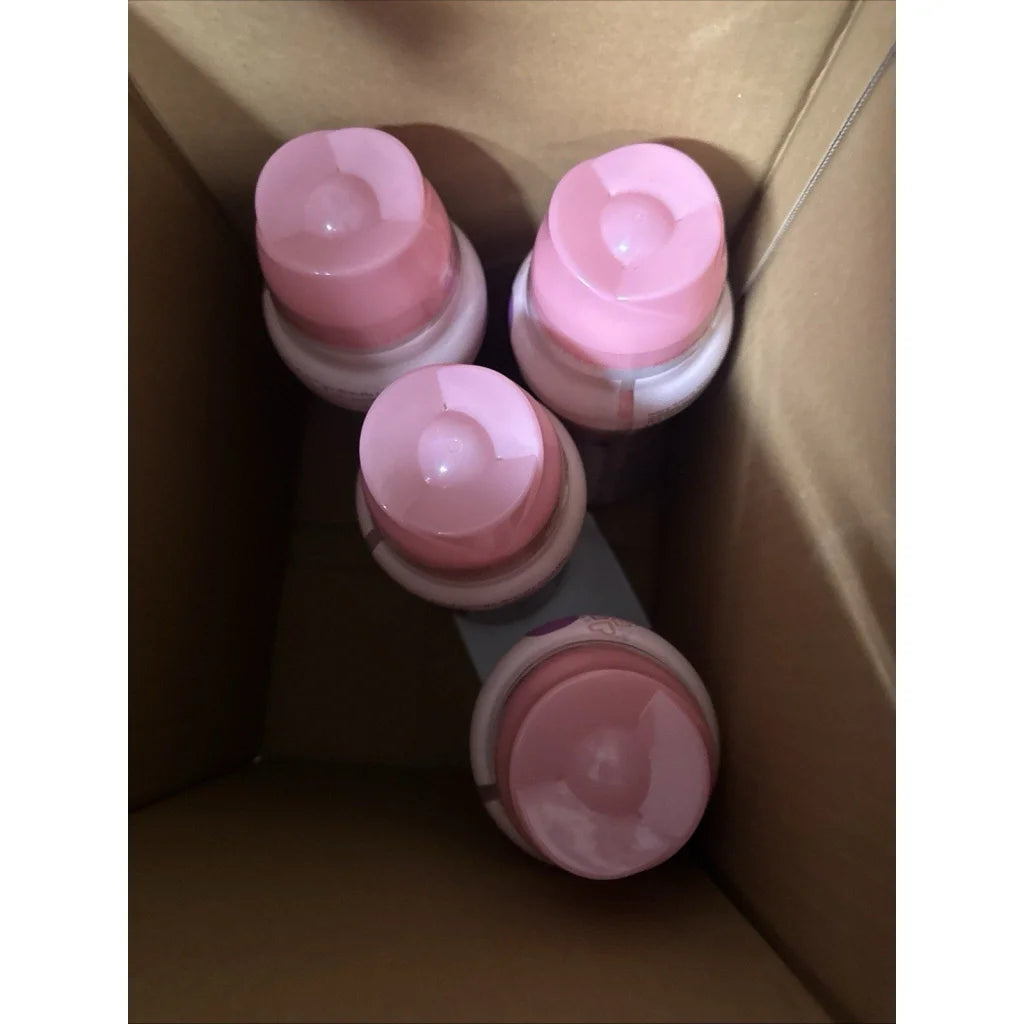 Ivory Snow Blissfuls laundry scent booster beads baby fresh scent in pink-capped bottles
