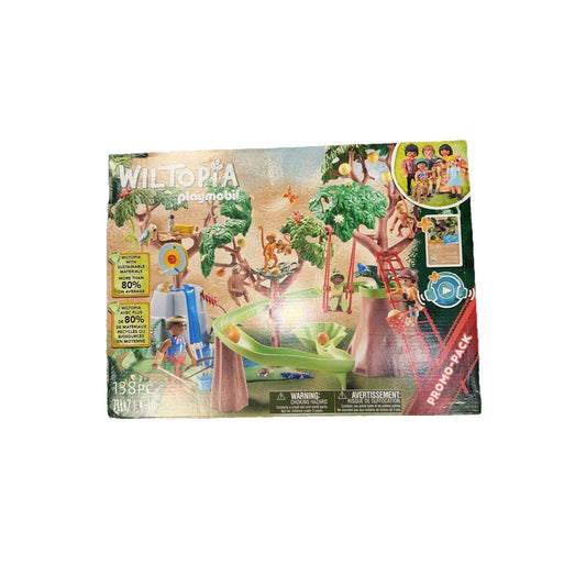 Playmobil Wiltopia tropical jungle set box displayed front-facing, showing colorful packaging with illustrated play scene, figures, and green tree structures.