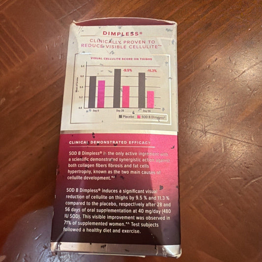 Dimpless supplement box back panel displaying clinical efficacy bar chart and product benefits text on wooden surface.