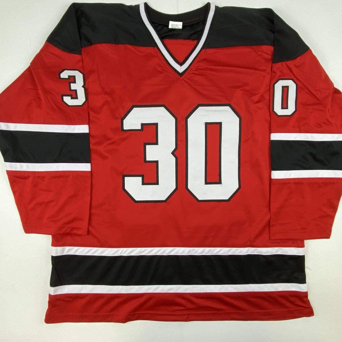 Red hockey jersey with black and white horizontal stripes, number 30 centered on chest, numbers 3 and 0 on shoulders, displayed flat against white background.