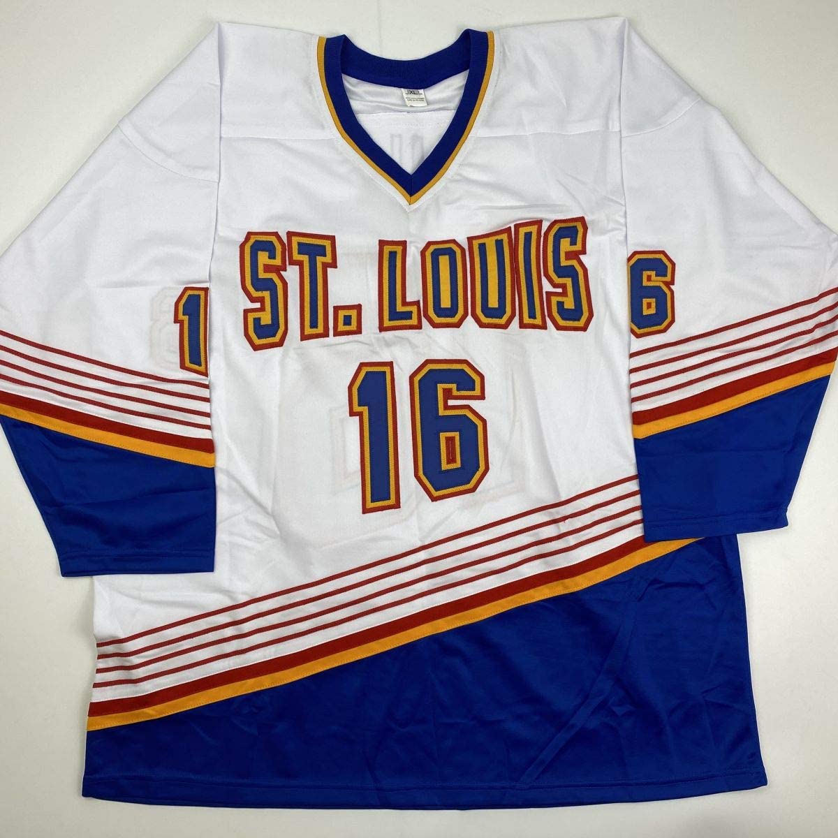 White St. Louis hockey jersey number 16 with blue and red striped accents displayed flat against white background.