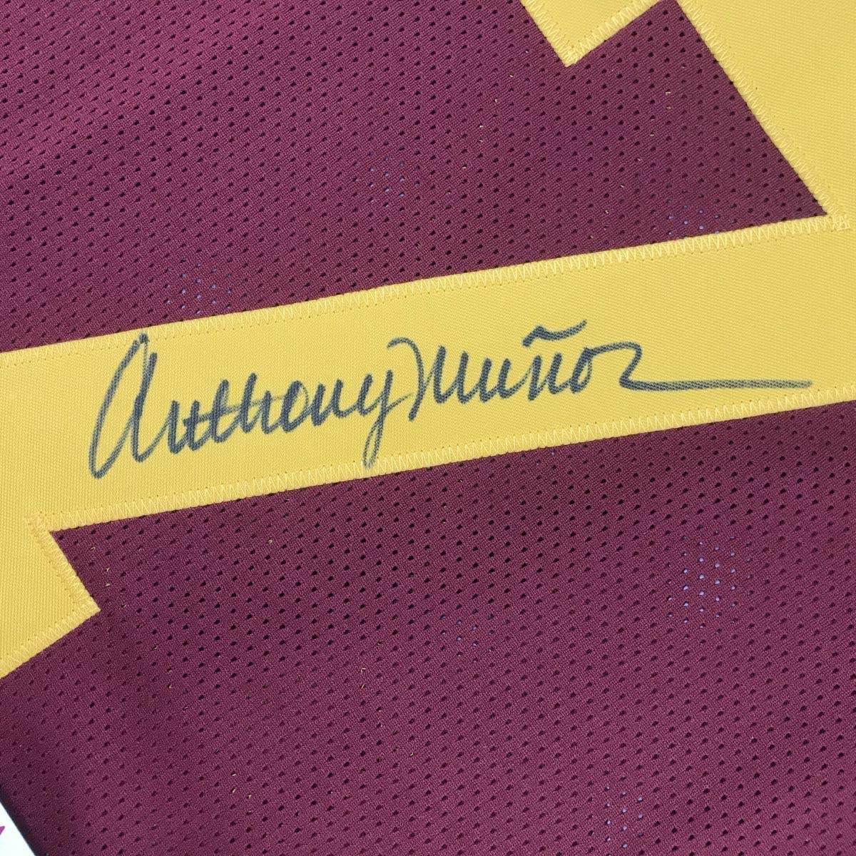Anthony Munoz signature close up on USC Trojans maroon college football jersey in 35x39 frame