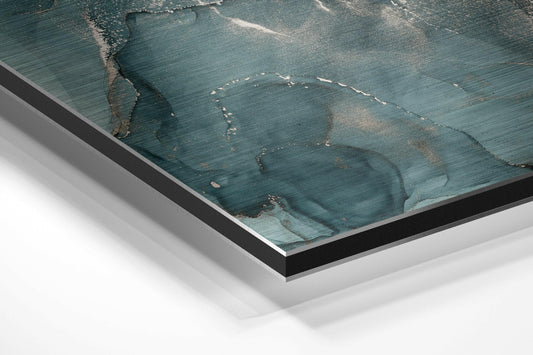 Angled perspective view of teal and silver marble patterned aluminum dibond panel with black and silver frame edges against white background.