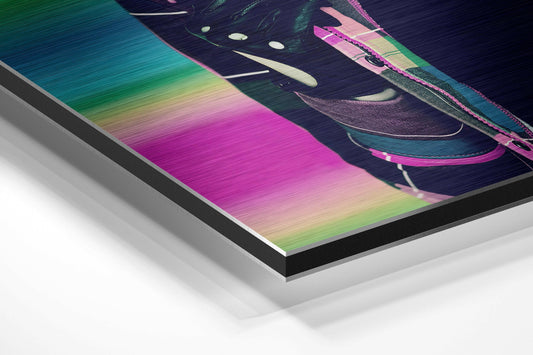 Angled perspective shot of brushed aluminium dibond wall art displaying colorful rainbow gradient stripes and stylized pink lips design.