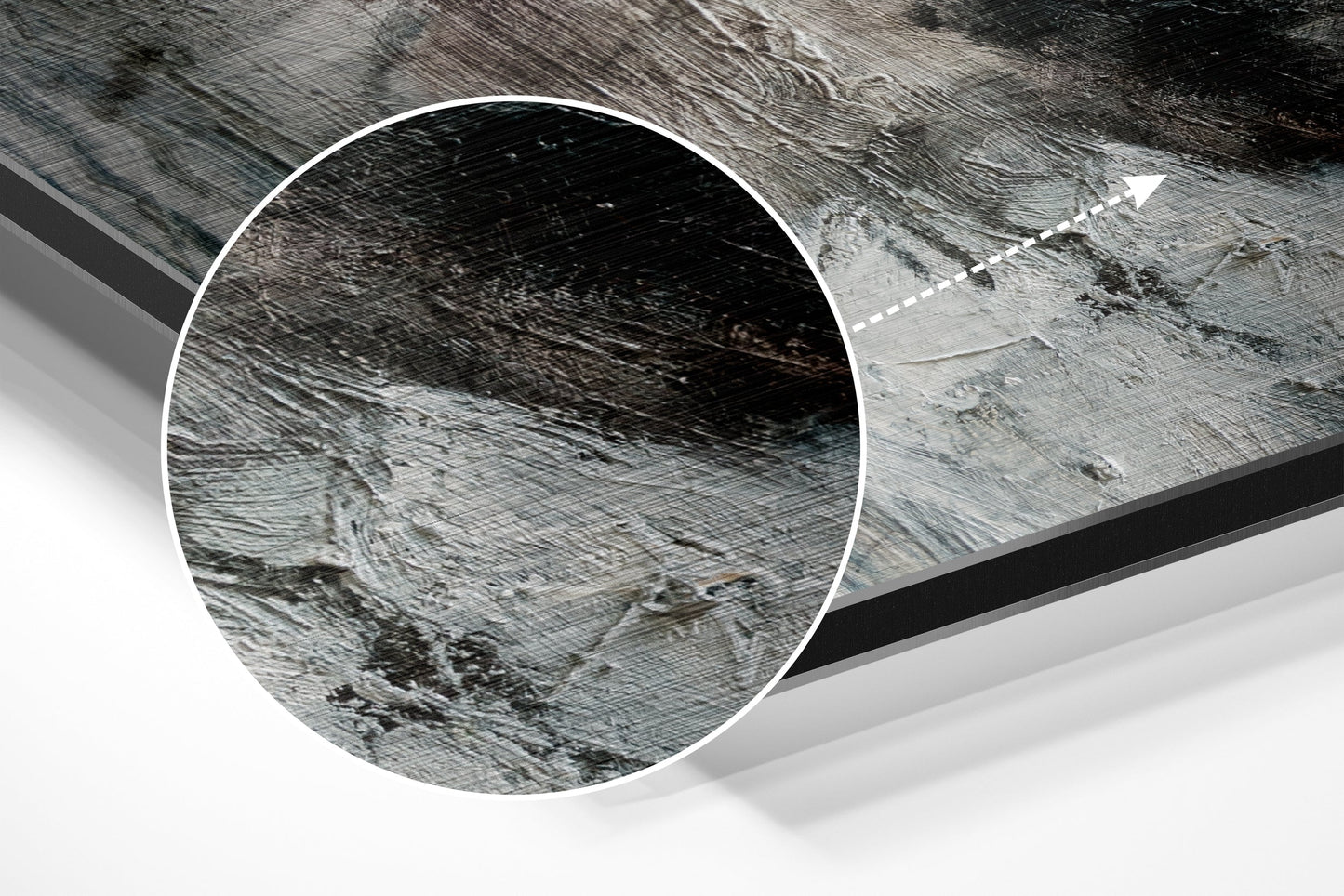 Close-up detail of brushed aluminium Dibond wall art showing textured metallic surface with directional grain patterns and subtle reflective qualities.