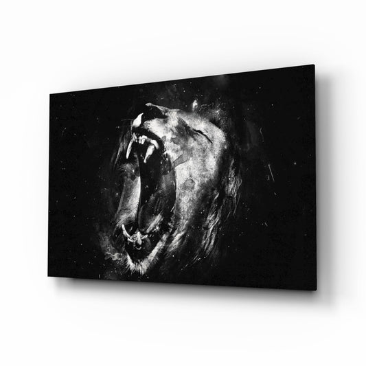 Black and white glass wall art displaying a close-up of a roaring lion's face with visible fangs against a dark background.