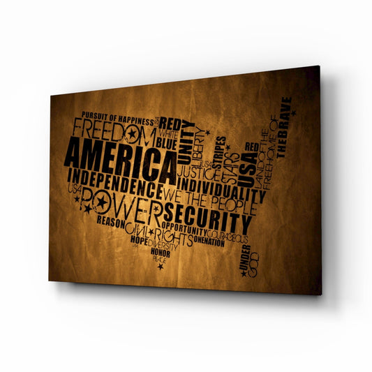 Glass wall art displaying USA map filled with patriotic words like "Freedom," "America," and "Independence" on aged brown textured background, angled perspective view.
