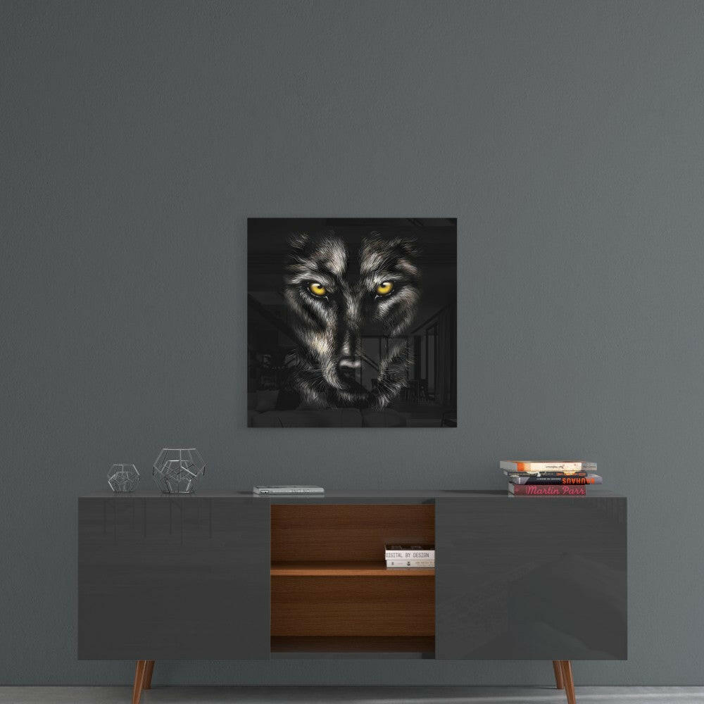 Square glass wall art featuring a wolf's face with piercing yellow eyes against black background, displayed above a mid-century modern credenza.