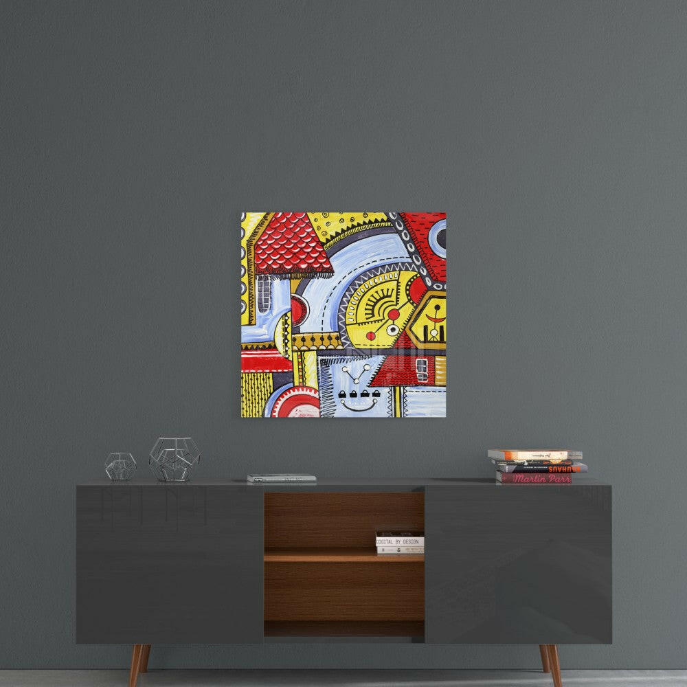 Colorful abstract houses glass wall art with red, yellow, and blue geometric patterns displayed above a mid-century modern console table.