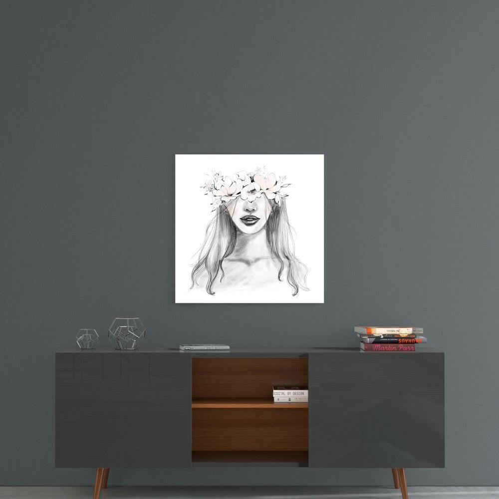 Framed sketch of a woman with long hair and floral crown displayed on gray wall above mid-century modern console table.