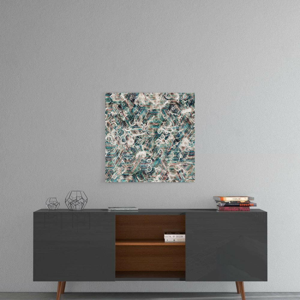 Square glass wall art with teal, cream, and charcoal abstract pattern displayed above mid-century modern credenza.