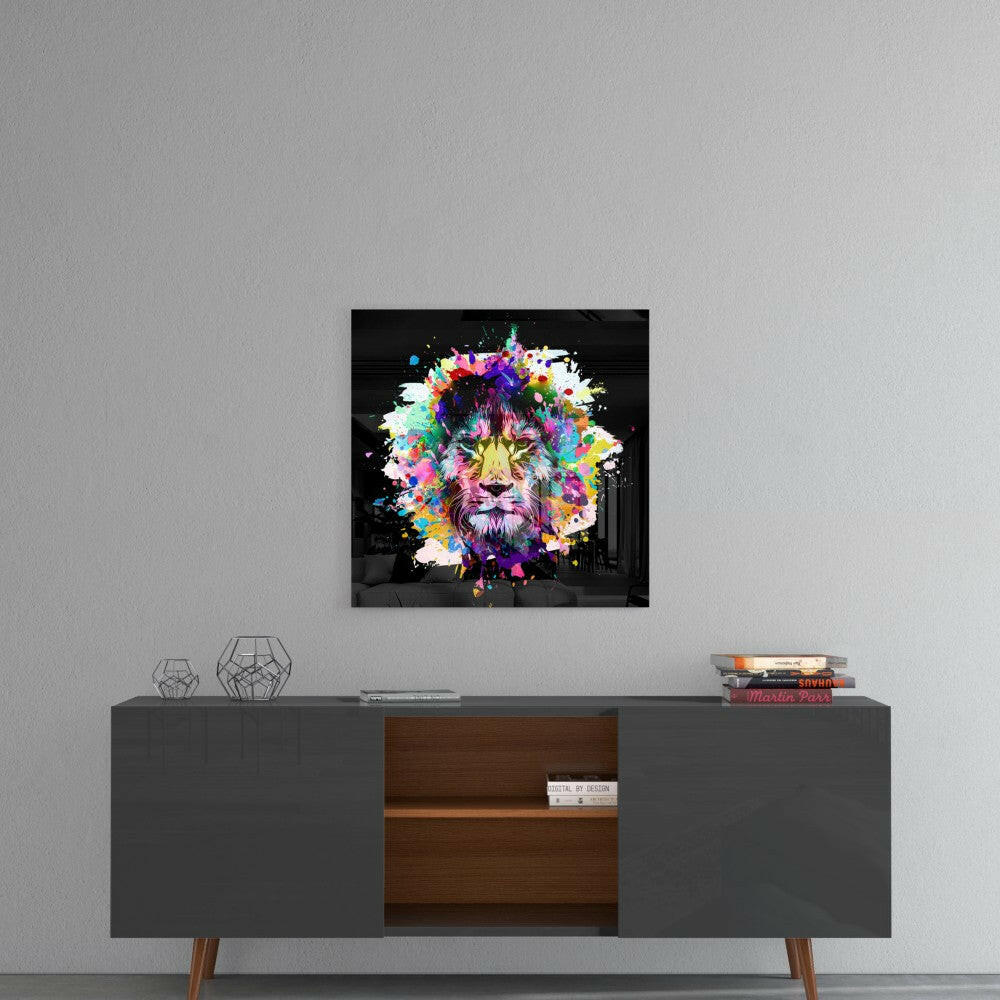 Colorful lion head artwork with vibrant paint splashes displayed on gray wall above mid-century modern credenza.