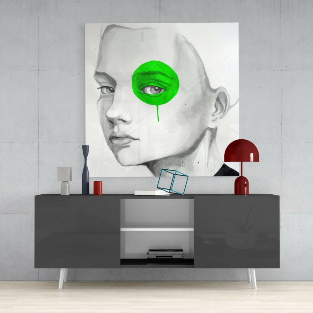 Green Look Glass Wall Art displayed above a dark gray console table, showing a grayscale portrait with bright green circular overlay.