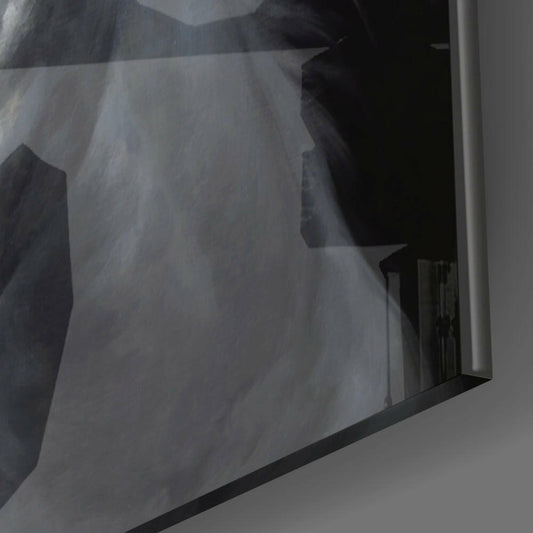 Close-up angled view of glass wall art showing white stallion head portrait with black frame edge against white wall.