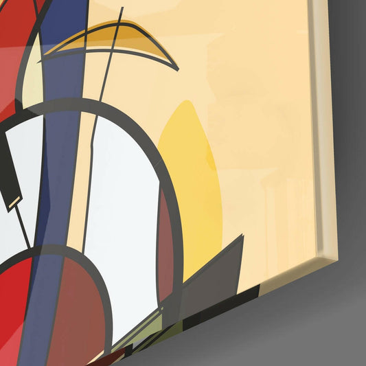 Close-up detail of glass wall art showing bold geometric shapes in red, blue, yellow, black, and white with curved lines and angular forms.