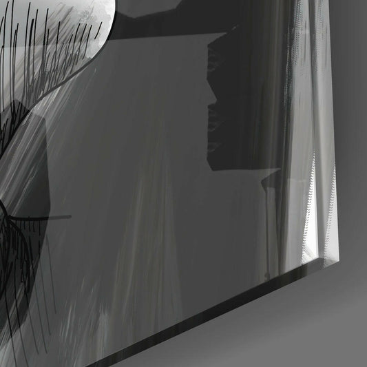 Close-up angled view of translucent glass panel with etched linear patterns and dark silhouette profile, backlit by bright window light.