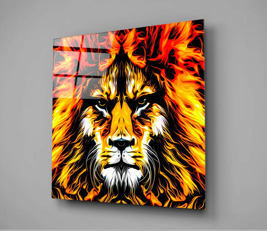 Square glass wall art displaying a stylized lion's face with fiery orange and yellow flames surrounding its mane against a black background.