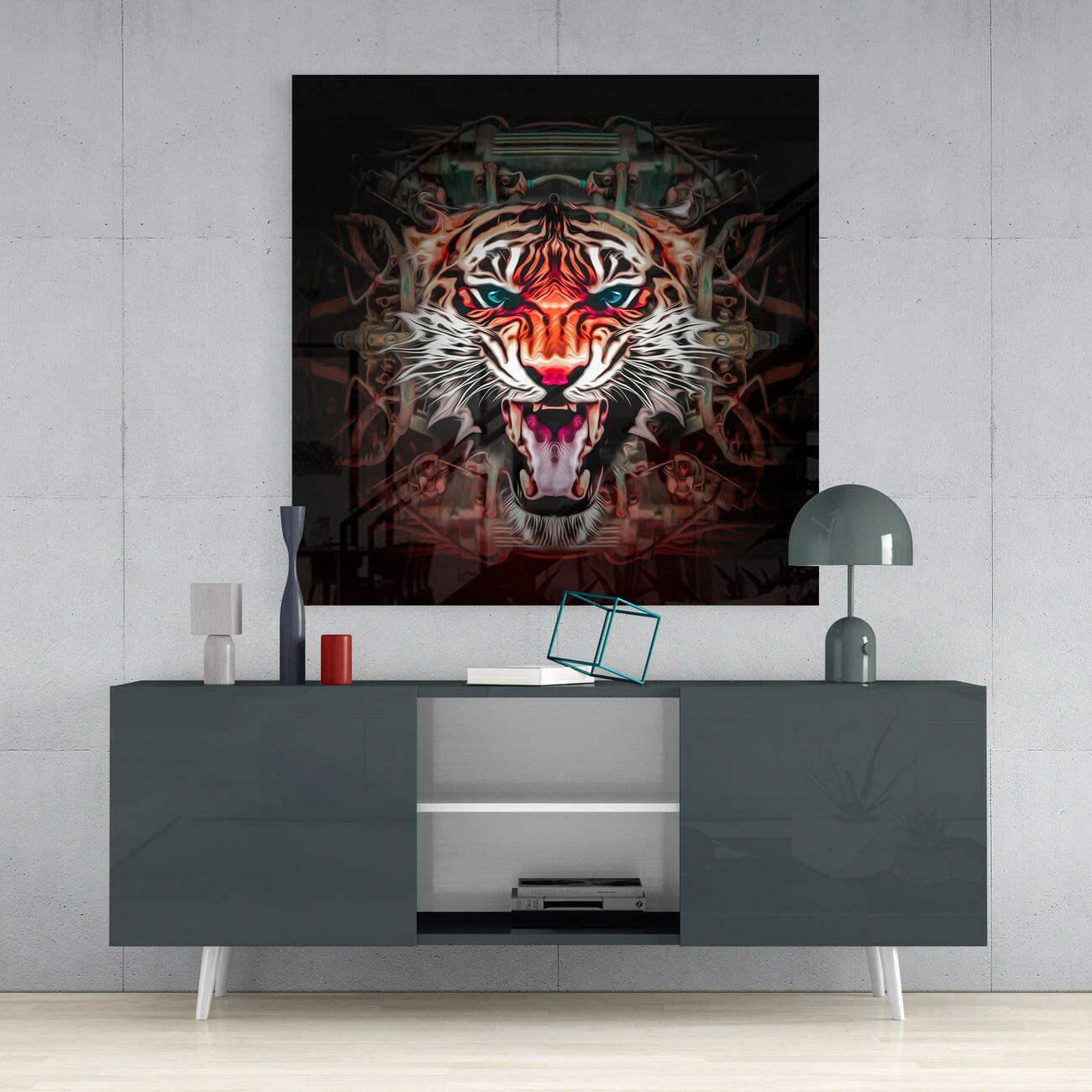 Modern living room interior with dark gray media console displaying vibrant tiger face glass wall art above, flanked by decorative accessories and lamp.