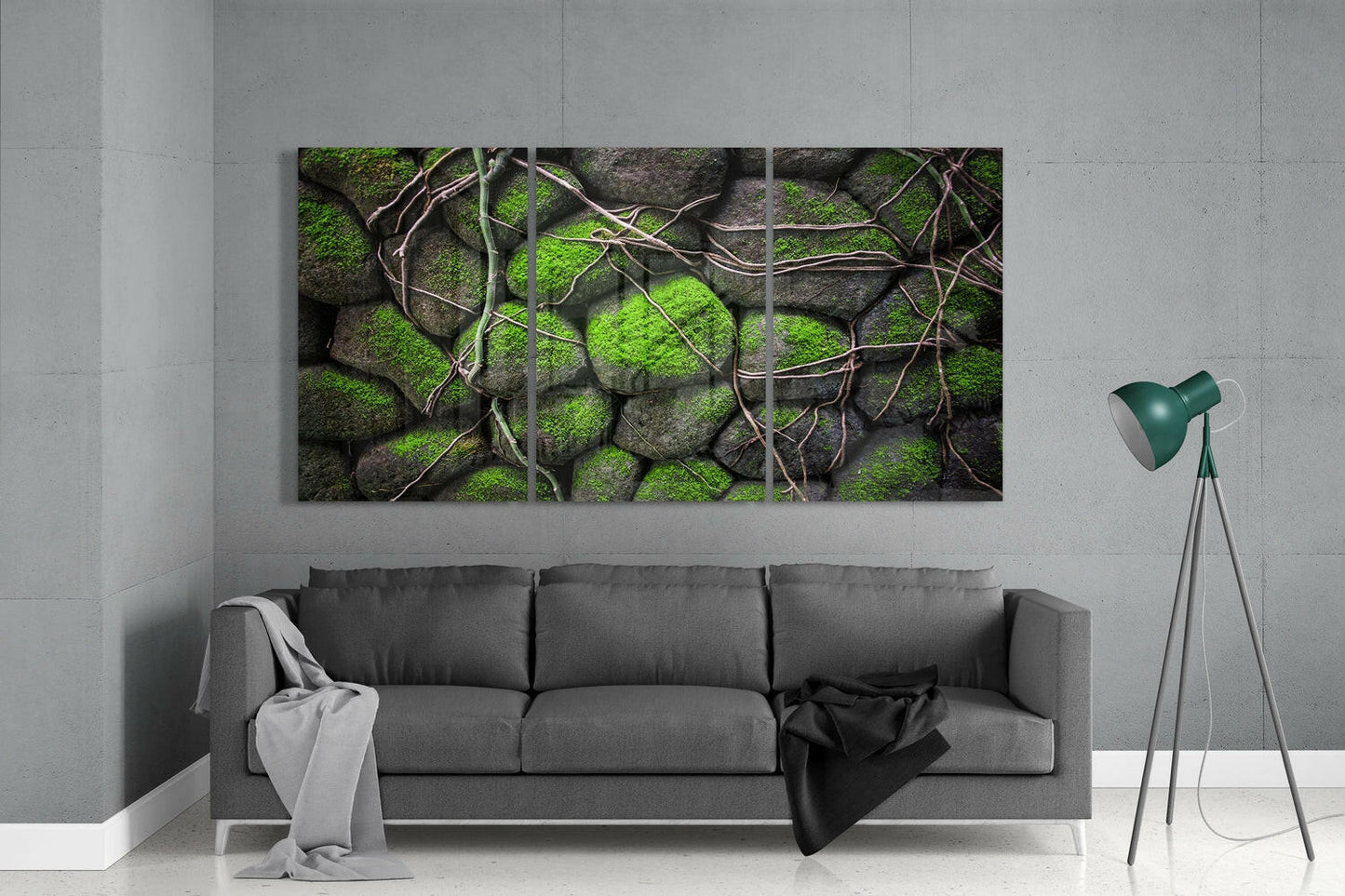 Mossy Stones Mega Glass Wall Art displayed above gray sofa in modern living room with green moss, gray rocks, and brown vines.