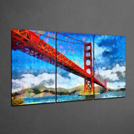 Three-panel glass wall art displaying the Golden Gate Bridge in painterly style, mounted at an angle against a gray wall.