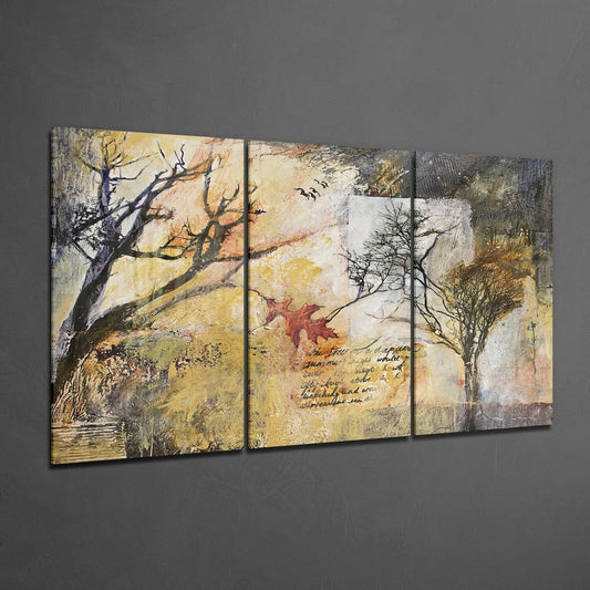 Three-panel glass wall art displaying bare trees in sepia and gold tones with handwritten script text on neutral background, angled perspective view.