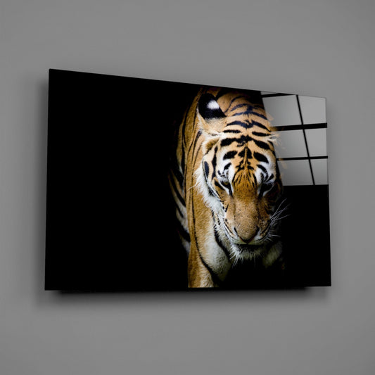 Glass wall art mounted on gray wall displaying tiger's face emerging from shadows with grid pattern overlay on right side.