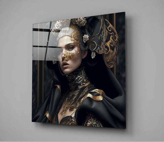 Glass wall art featuring a pale-faced woman in black cloak with gold baroque ornamental details and white headpiece, displayed at an angle against gray wall.