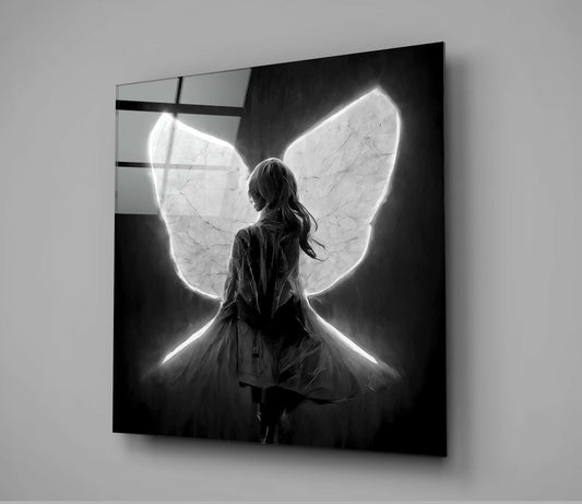 Black and white illustration of a girl viewed from behind with luminescent white neon wings on glass panel mounted on gray wall.