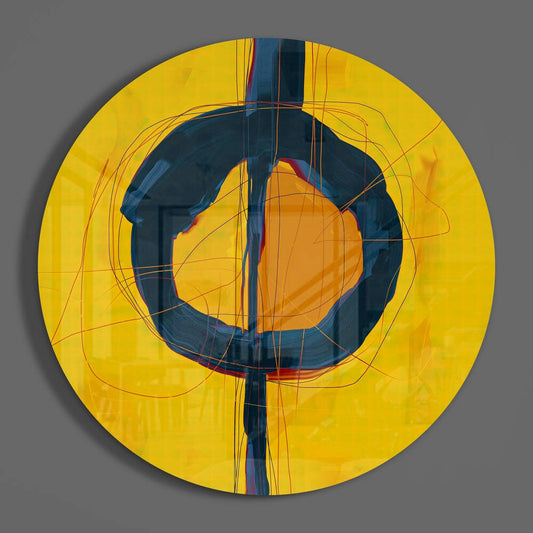 Circular glass wall art with concentric yellow, navy blue, and orange layers intersected by dark vertical lines on gray background.