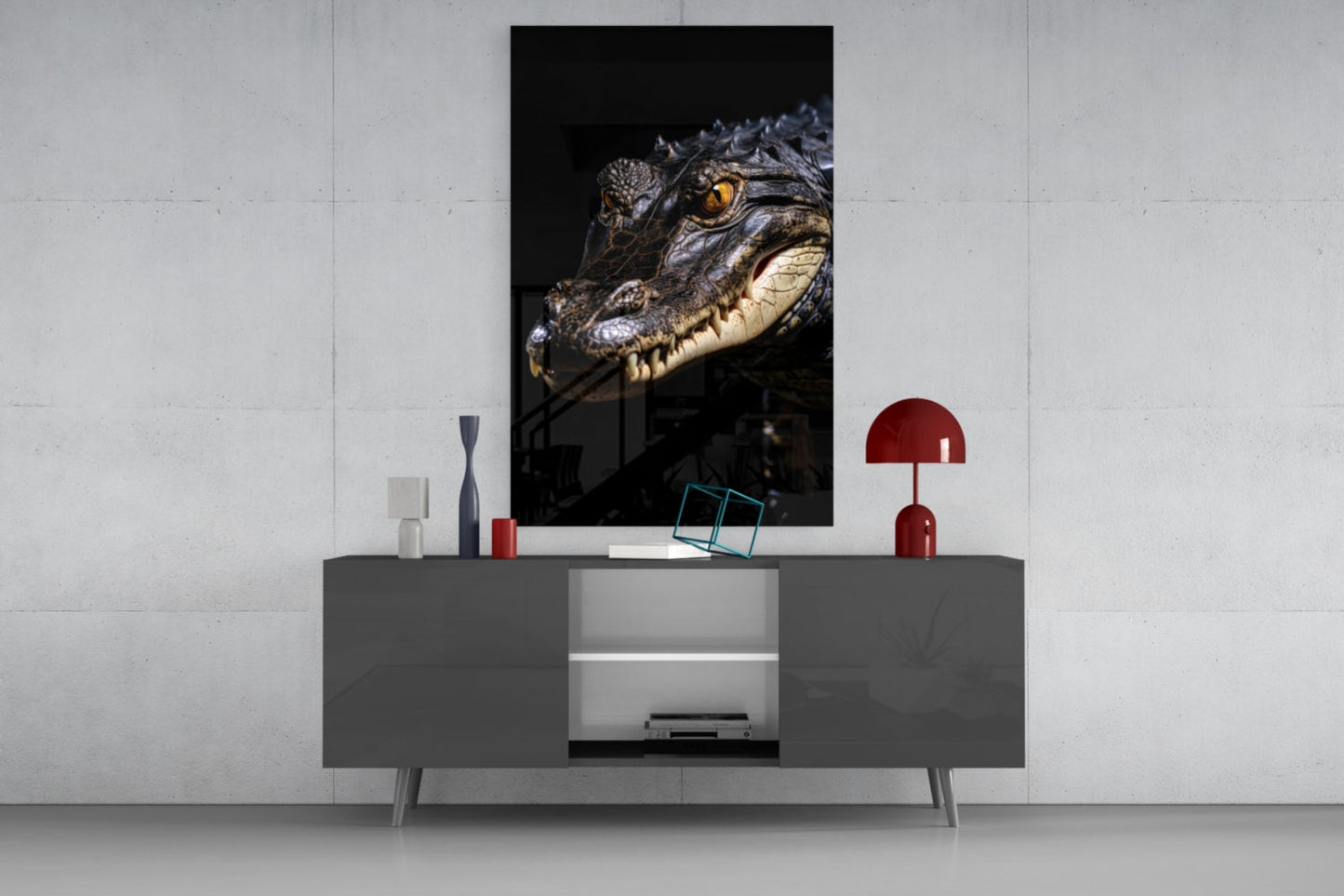 Close-up portrait of a crocodile with amber eye and cream-colored teeth against black background, displayed as framed wall art above gray media console.