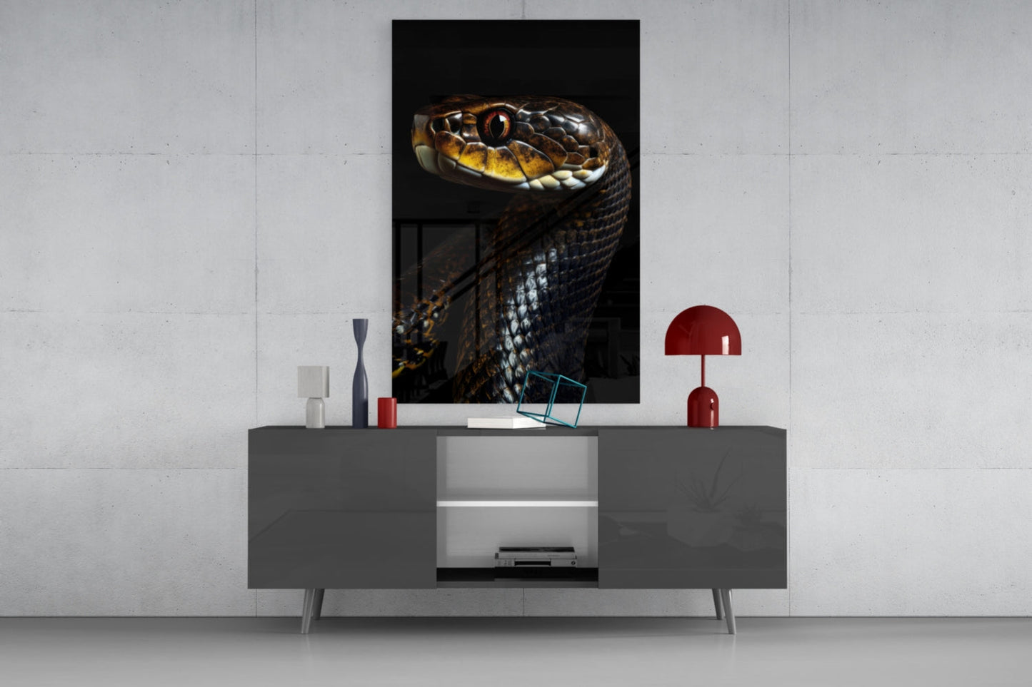 Golden-eyed black snake glass wall art displayed above gray media console with red lamp and decorative accessories.