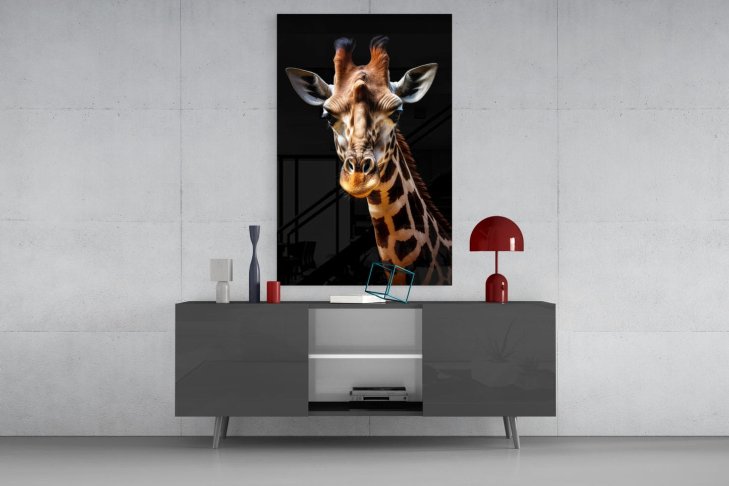 Modern living room display with giraffe portrait glass wall art mounted above gray media console with red accents.