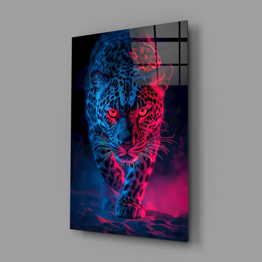 Angled view of neon leopard glass wall art showing blue and pink illuminated design mounted on gray wall.