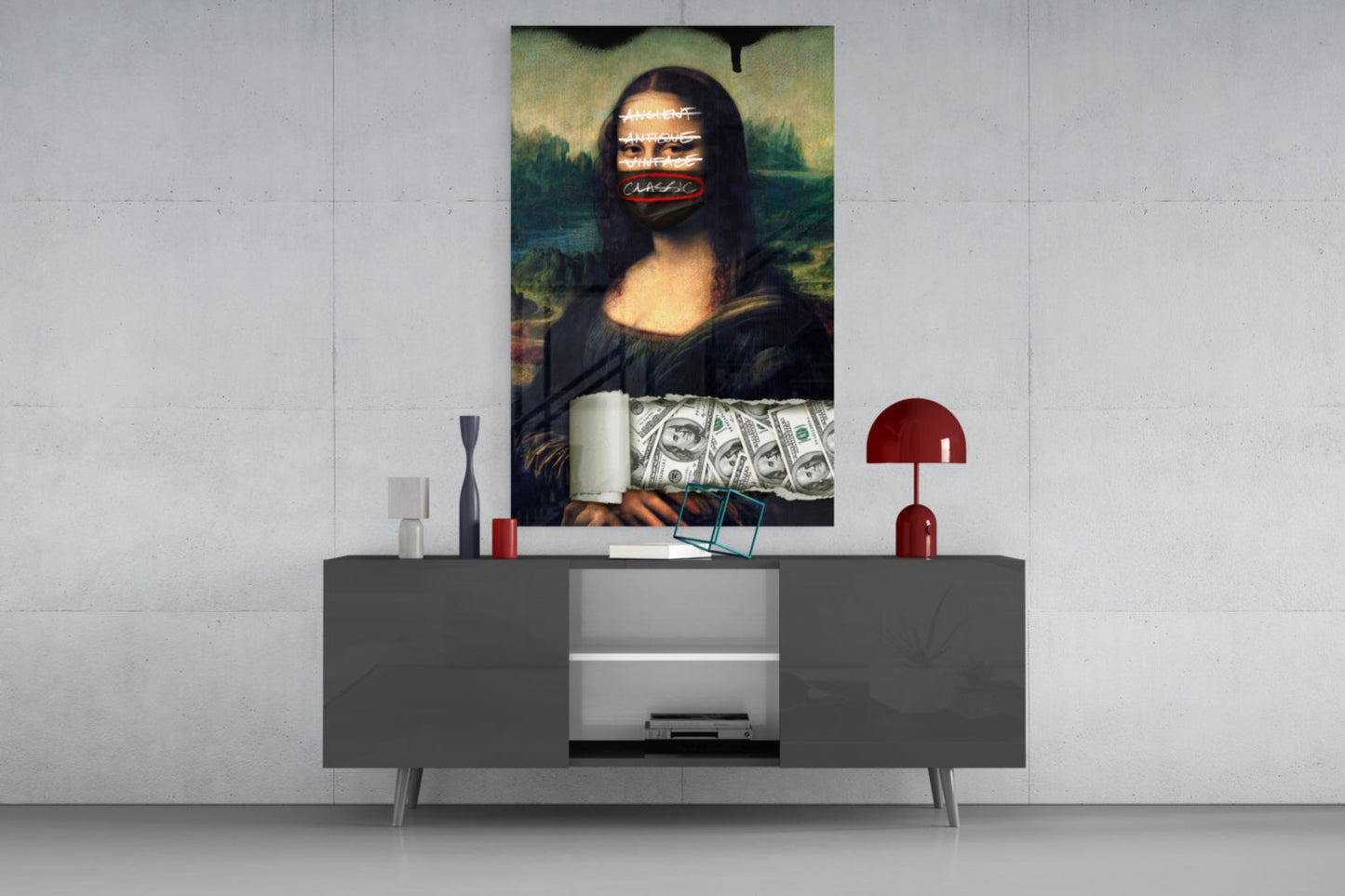 Modern Mona Lisa glass wall art with neon text overlay and dollar bills displayed above gray media console in contemporary interior setting.