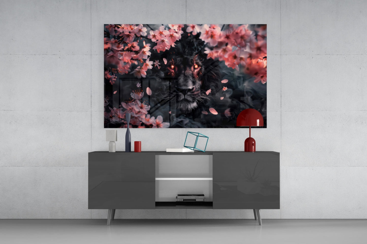 Modern living room displaying Lion of the Night glass wall art above gray media console with red accents.