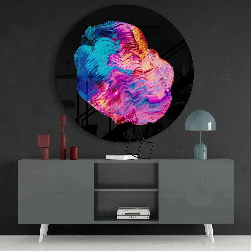 Vibrant swirling tempered glass art in blue, pink, orange hues on black mirror